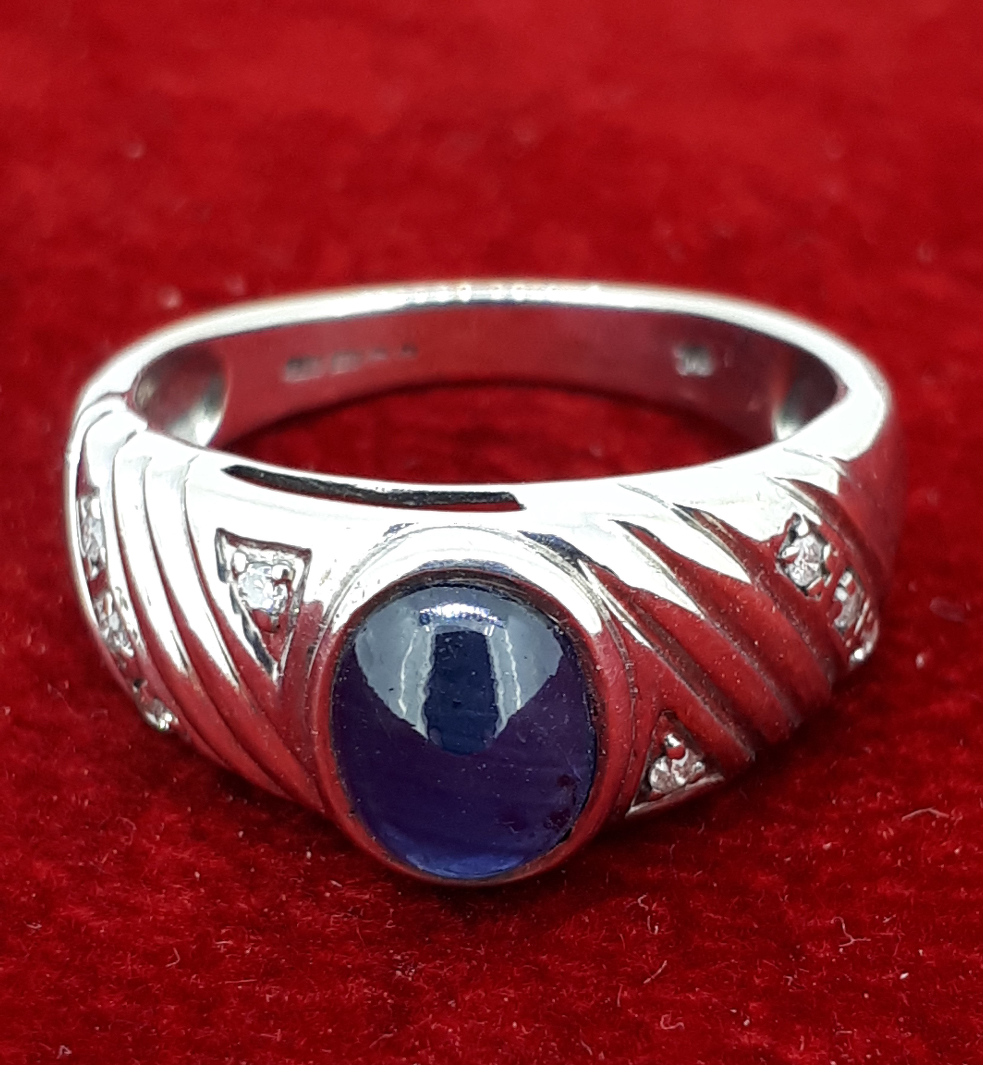 9ct (375) White Gold Oval Sapphire and Diamond Ring