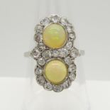 Antique, Victorian ring set with cabochon opals and old-cut diamonds, in 18ct white gold.