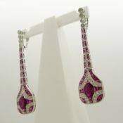 Long platinum Art Deco-style drop earrings set with rubies and diamonds