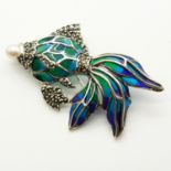 A silver plique-à-jour flying fish brooch set with a cultured pearl and marcasite stones.