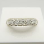 An 18ct white gold 0.50 carat 5-stone diamond ring.