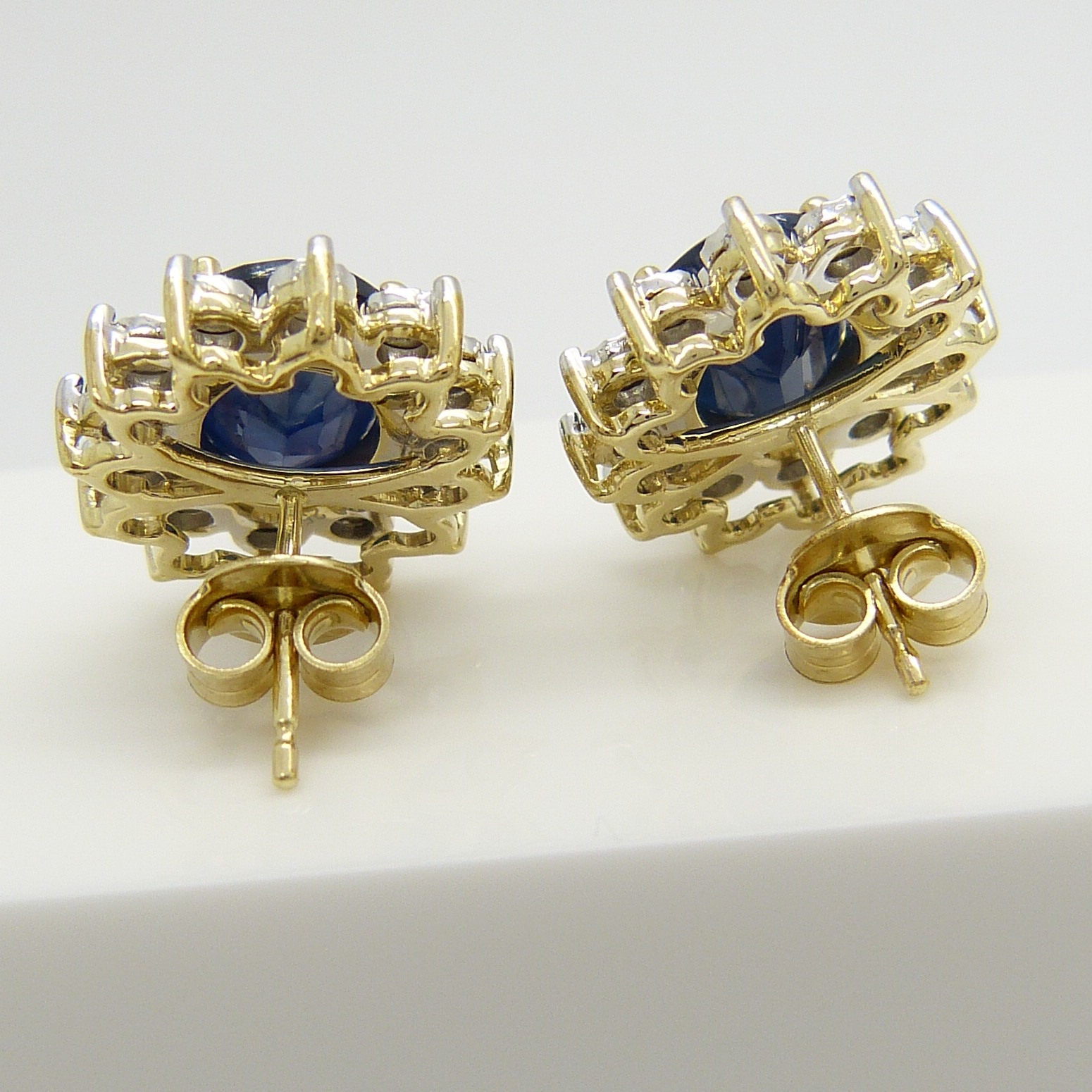 A stunning pair of 9ct yellow gold treated blue sapphire and diamond cluster ear studs, boxed. - Image 5 of 5