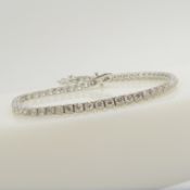 A stunning 18ct white gold 4.00 carat round brilliant-cut diamond line bracelet, boxed.
