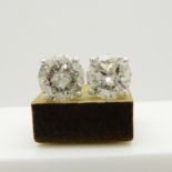 Round brilliant-cut diamond solitaire studs of 2.53 carats, boxed.