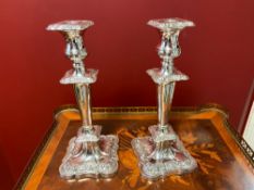 Pair of silver Victorian candlesticks