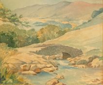 Signed watercolour painting by L T Nicholson depicting a Bridge in a country landscape