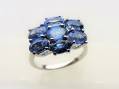 3.3 carat Tanzanite Cluster Ring