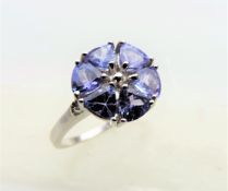 2.5 carat Trillion Cut Tanzanite Cluster Ring