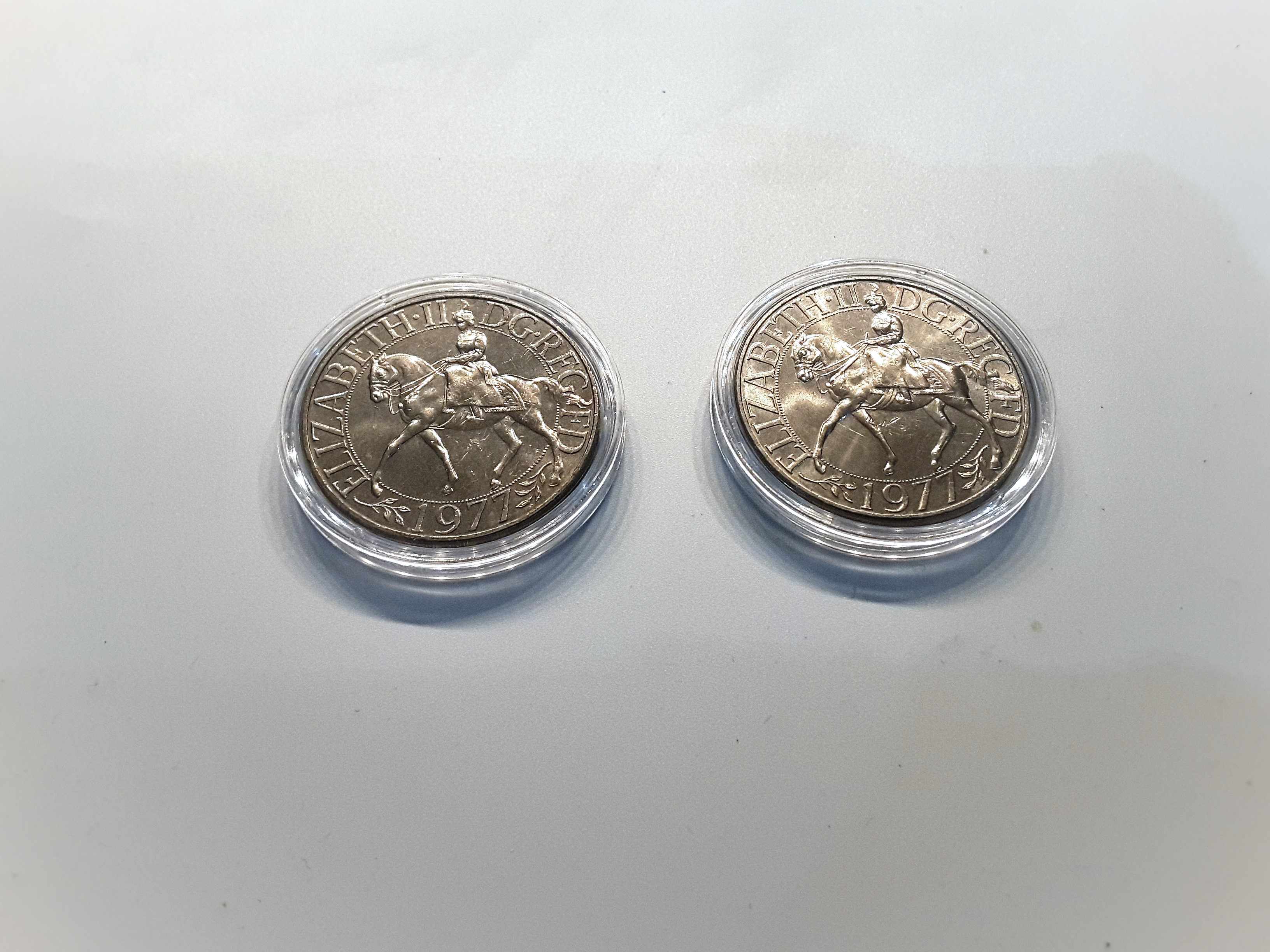 A PAIR OF 1977 QUEEN ELIZABETH SILVER JUBILEE CROWNS