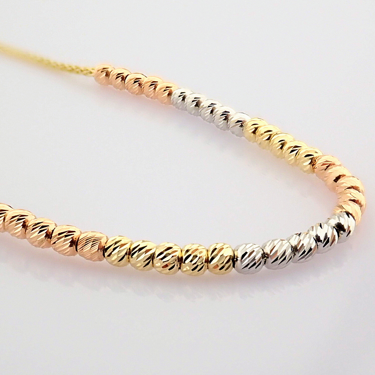 21 cm (8.3 in) Italian Beat Dorica Bracelet. In 14K Tri Colour White Yellow and Rose gold