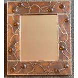 Handmade pewter mirror with amber coloured cabochons