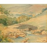 Signed watercolour painting by L T Nicholson depicting a Bridge in a country landscape