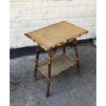 A vintage bamboo and rattan side table.