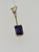 9ct yellow gold iolite and diamond pendant