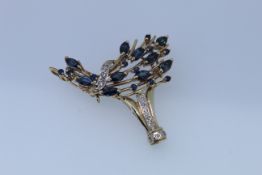 Yellow Metal Sapphire And Diamond Set Spray Broach