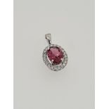 9ct white gold tourmaline and diamond pendant