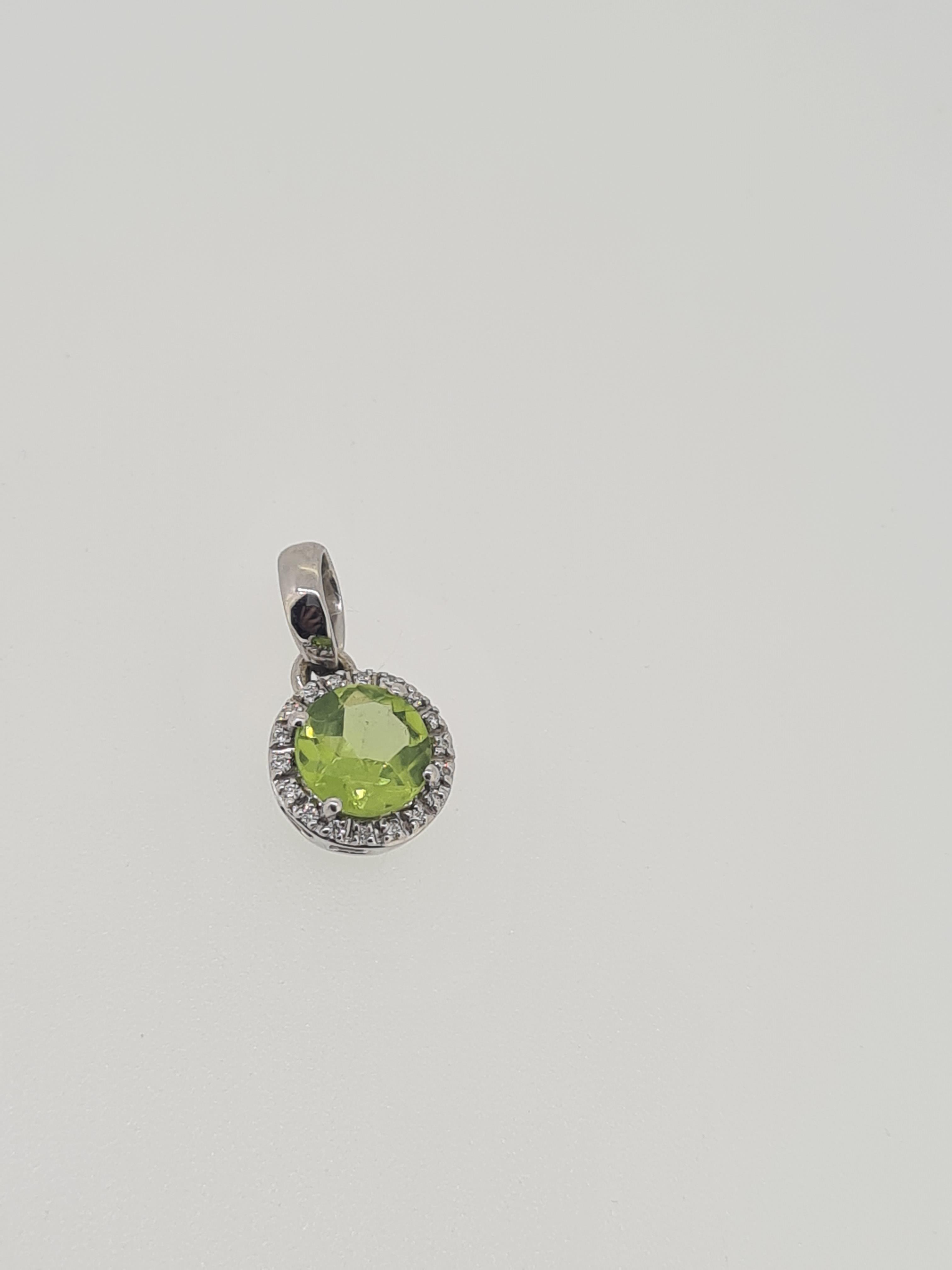 18ct white gold peridot and diamond pendant