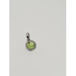 18ct white gold peridot and diamond pendant