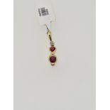 18ct yellow gold ruby and diamond pendant