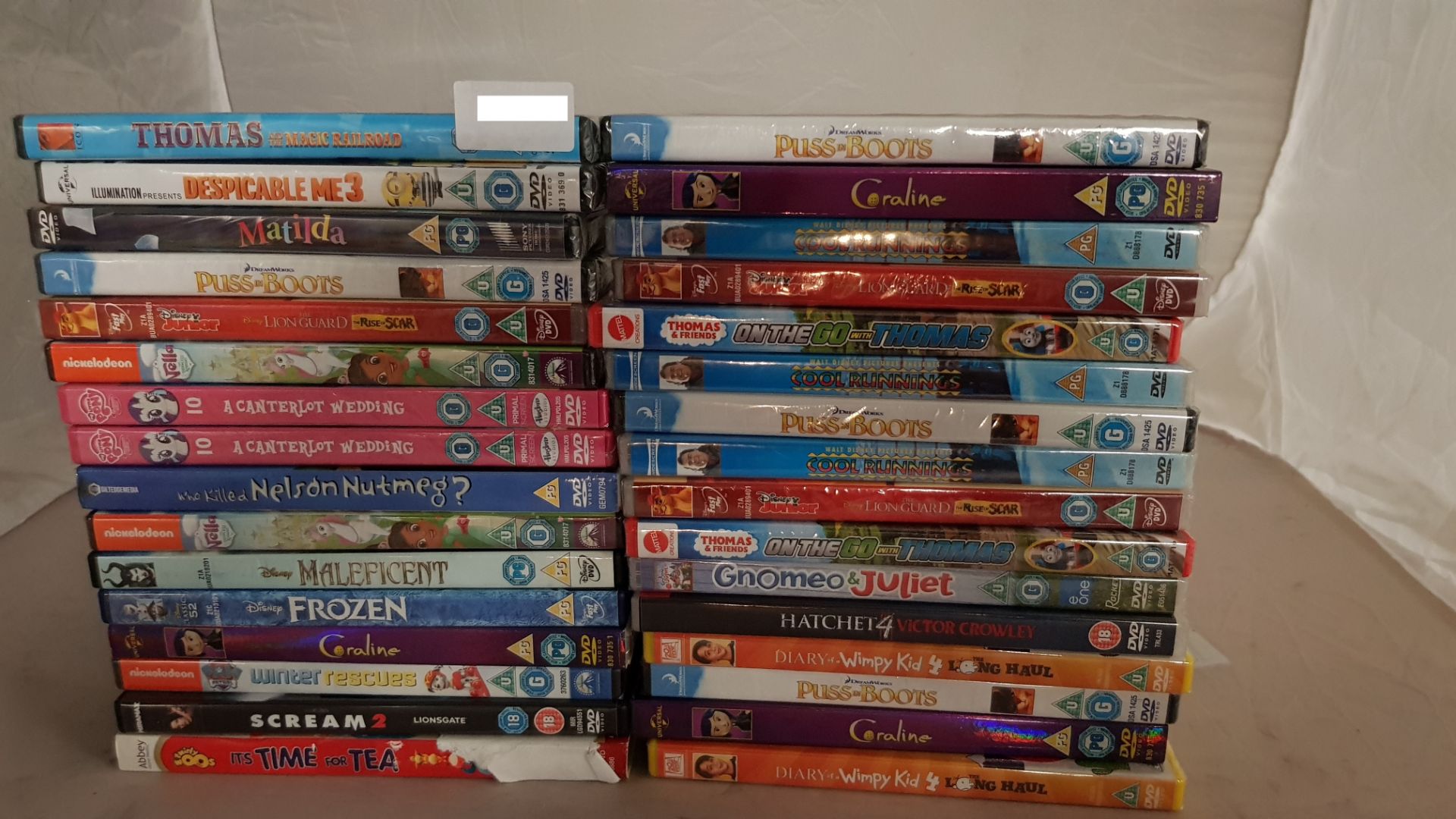 (R14D) 32 X Mixed DVD’s (All New / Sealed). To Include Frozen, Despicable Me 3, Coraline, Thomas