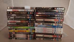 (R14F) 32 X Mixed DVD’s (All New / Sealed). To Include The Exorcist, Deadfall, Captive, How To Be