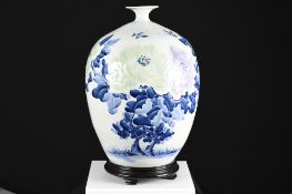 Blue and White Floral Vase with wooden base