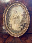 C18th Oval silkwork picture in giltwood