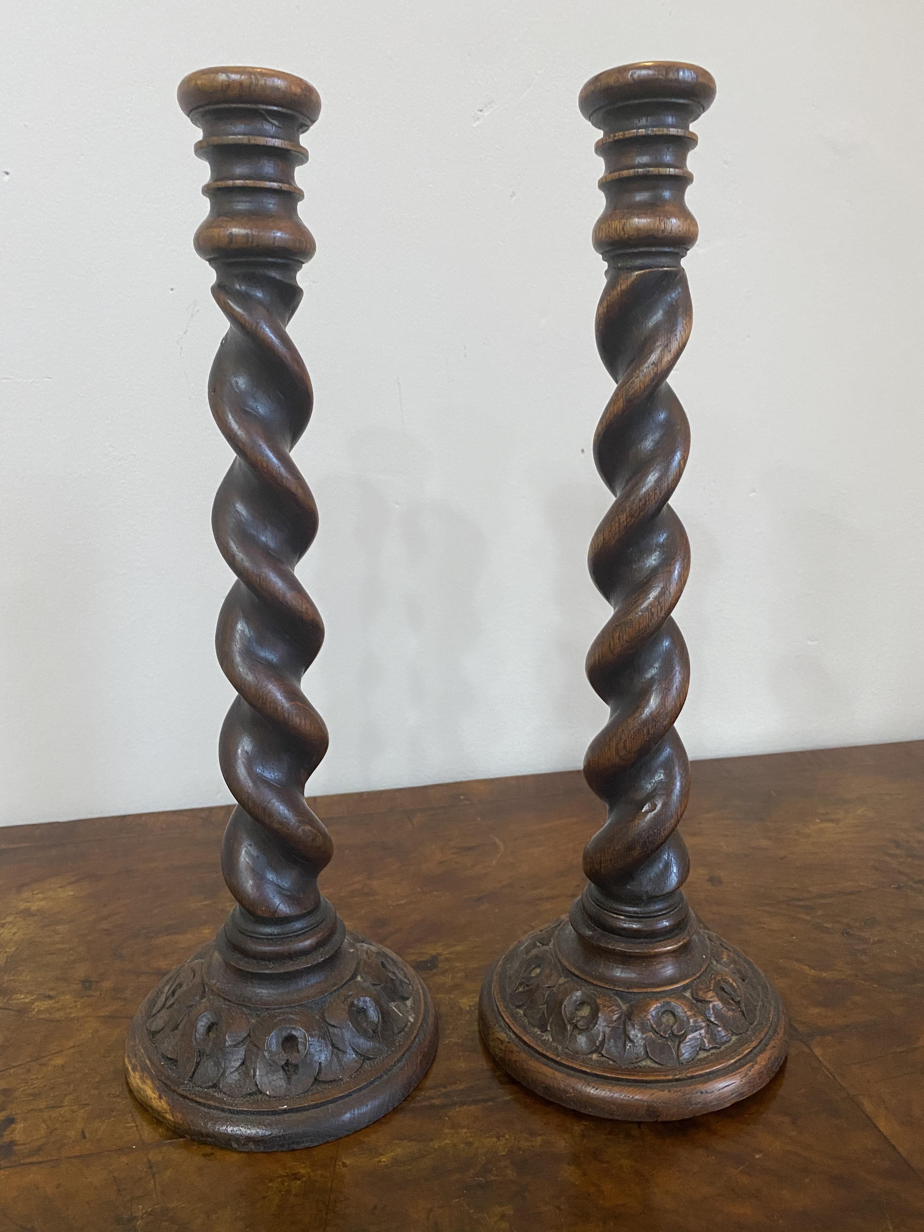 Pair of carved barley twist candlesticks