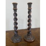 Pair of carved barley twist candlesticks