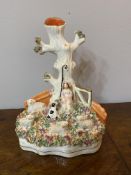C19th Staffordshire figure group showing a shepherdess and her dog amongst sheep