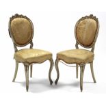 A pair of 19th century French cream & gilt painted salon chairs