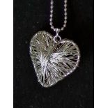 Heart Shaped Silver Tone Pendant And Chain