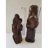 Large Wooden African Carving with Heads and a Large Farther Time