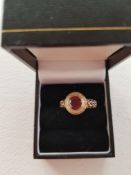 9ct Gold Ring With Garnets.