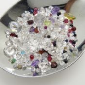 An assortment of over 100 unmounted stones totalling 95.10 carats.