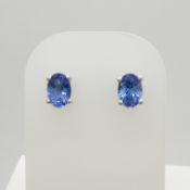 A pair of oval-cut tanzanite and silver ear studs 1.30 carats (approx)