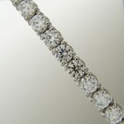 A stunning 7.25 carat diamond line bracelet in 18ct white gold, boxed.
