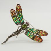 A large silver plique-à-jour peridot, ruby and marcasite dragonfly brooch/pendant