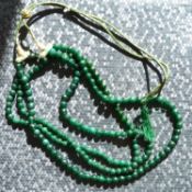 A 3-strand necklace of natural earth-mined emeralds totalling 575.00 carats (approx)
