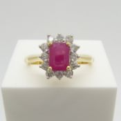 A WGI certificated 18ct yellow gold step-cut ruby and diamond cluster ring