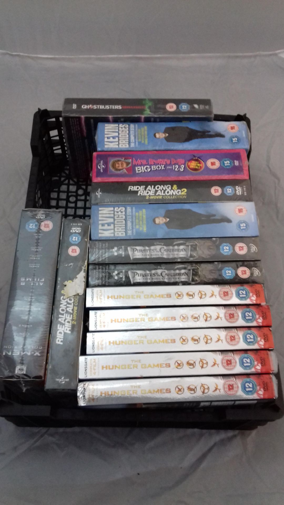 Approx 14 Sealed Box Sets To Include X-Men Collection, Ride Along, The Hunger Games.