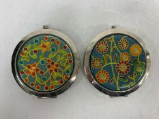 A PAIR OF VINTAGE FLORAL COMPACT MIRRORS