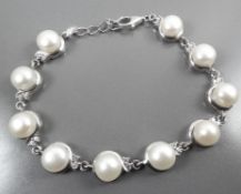 Silver 925 bracelet set with cultured pearls