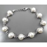 Silver 925 bracelet set with cultured pearls