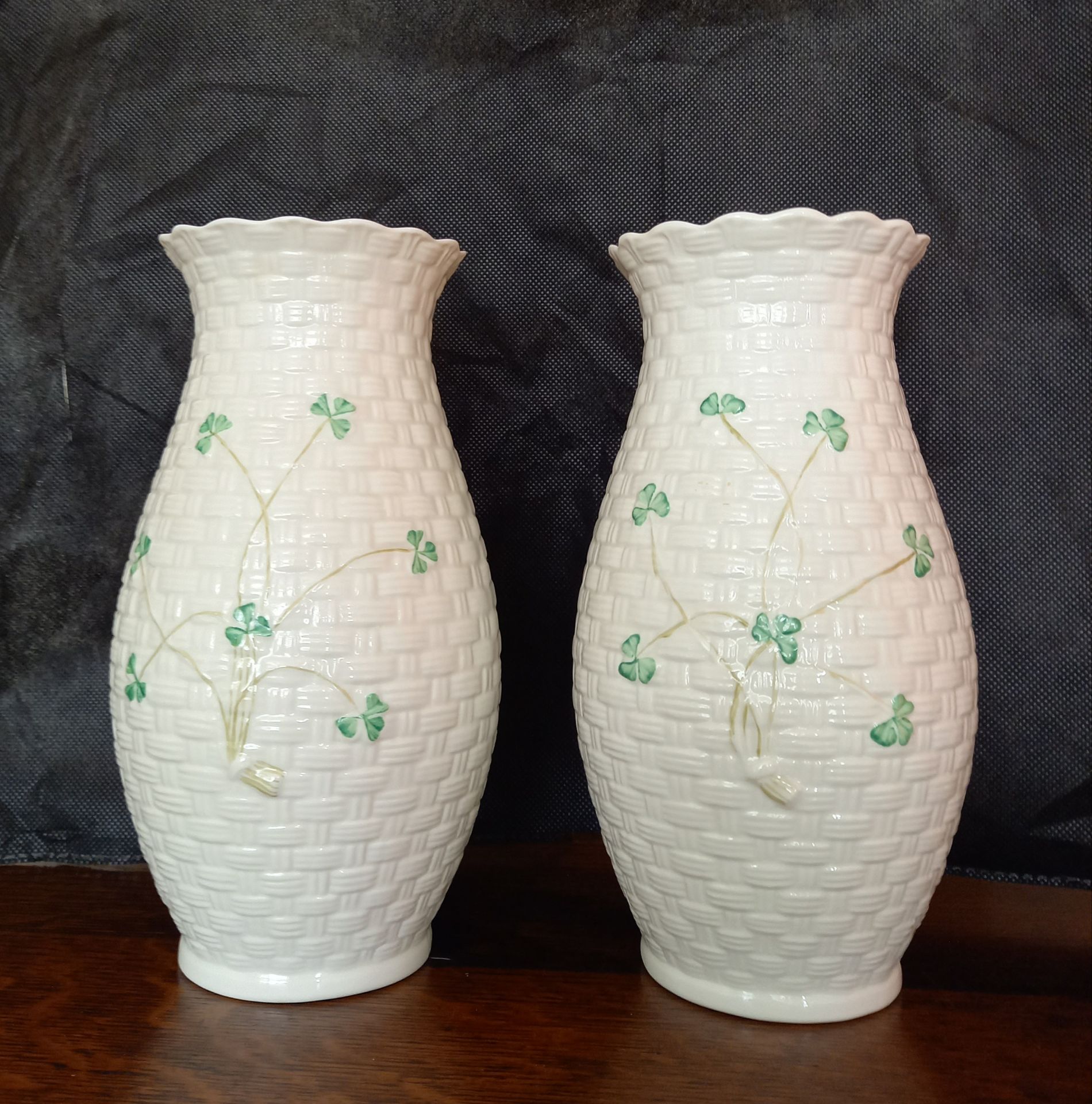 A pair of Belleek vases, 20cm
