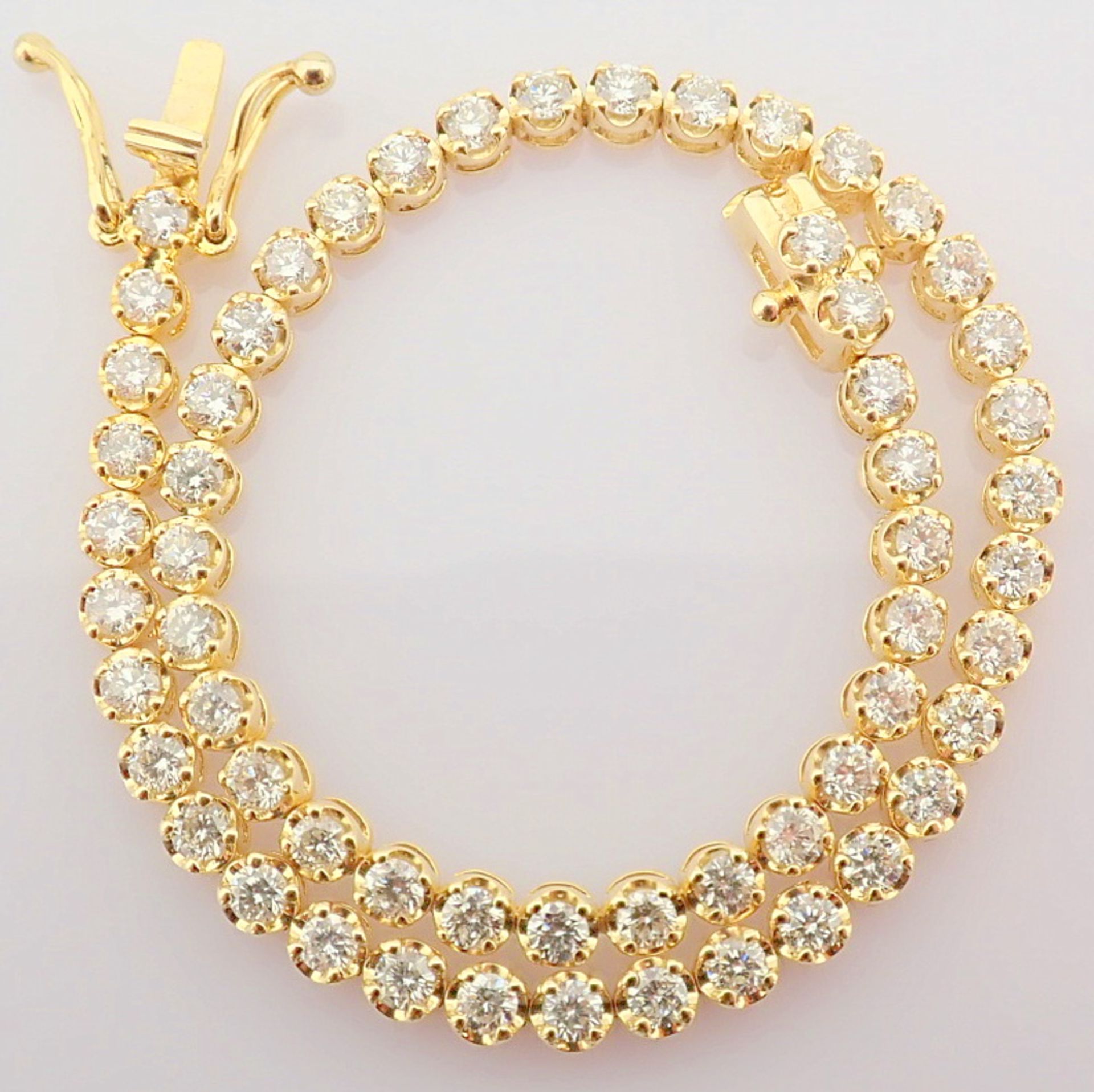 2,10 Ct. Diamond Tennis Bracelet (Crown) - 14K Yellow Gold