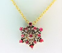 Gold on Silver Ruby Snowflake Pendant Necklace