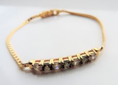 Mystic & White Topaz Gold Tone Bracelet