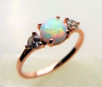 Rose Gold Opal and Topaz Ring