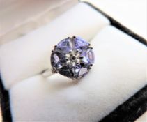 2.5 carat Tanzanite Cluster Ring in Sterling Silver